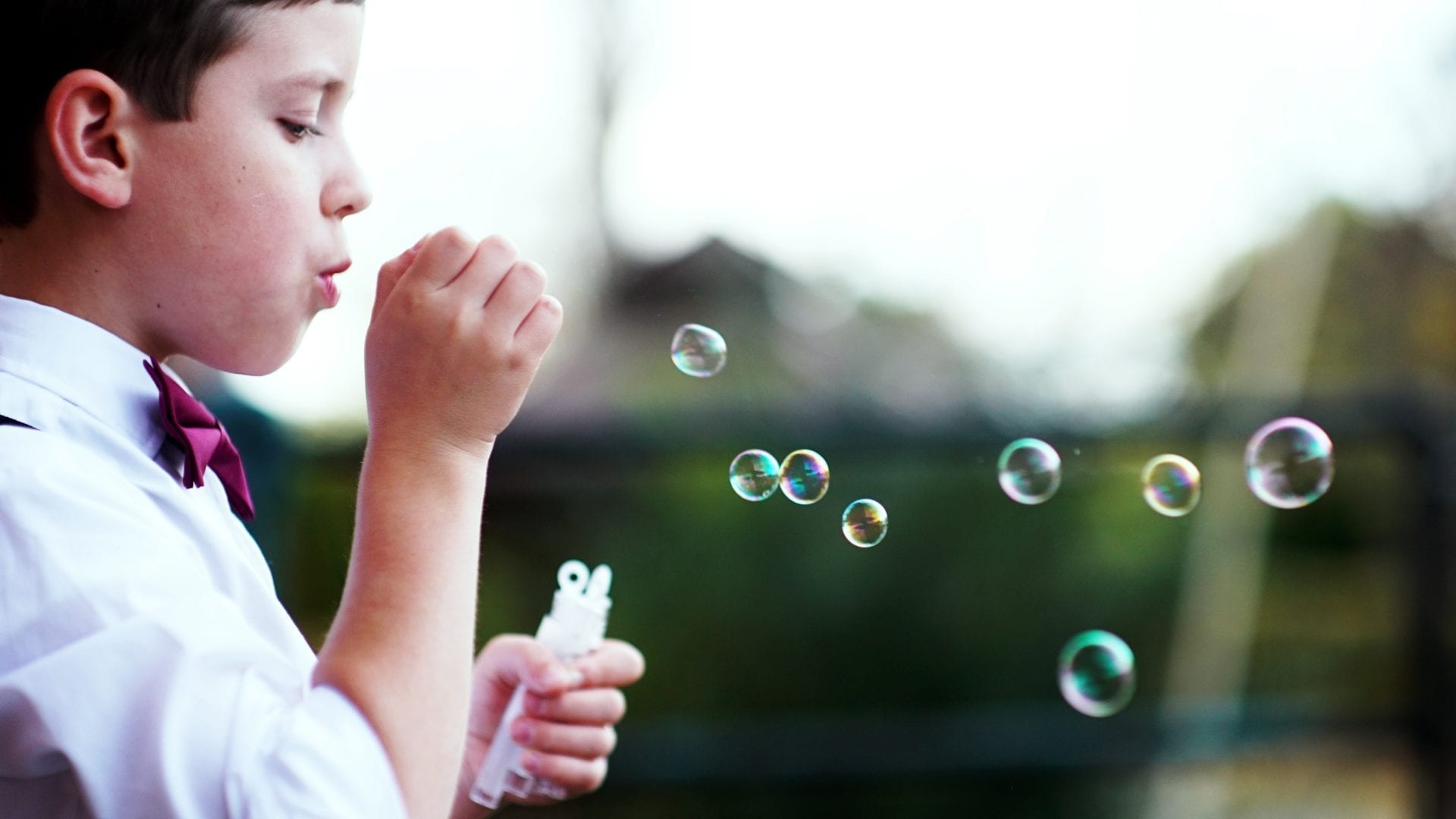 Child with bubbles Photo by Andre Hunter on Unsplash