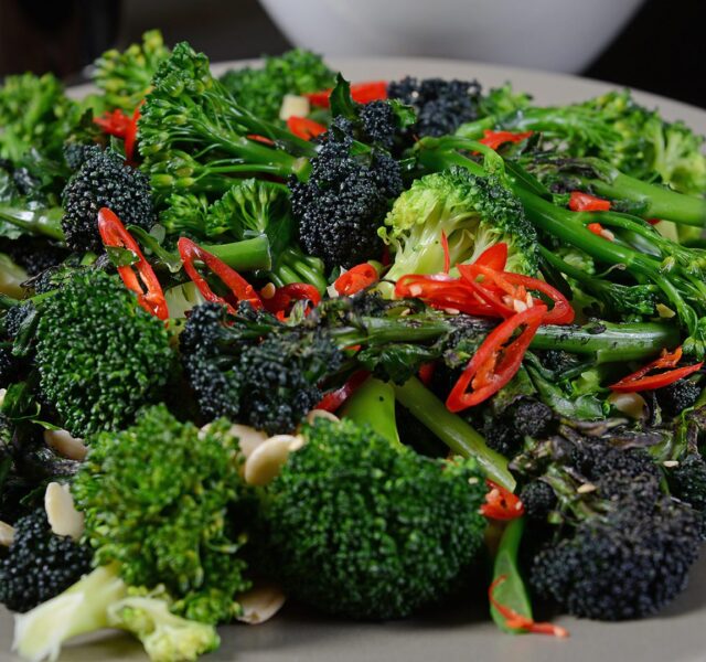 Broccoli salad, with slices of red chilli