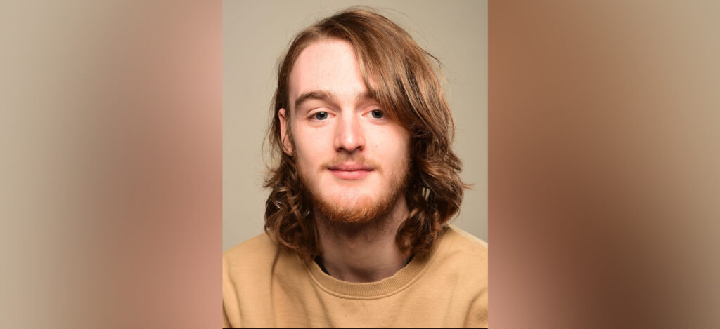 Portrait of Brody, a young man, looking straight forward