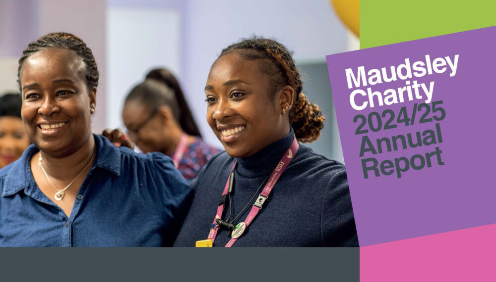 Cover of Maudsley Charity Annual Report 2024/25 - Two black women are shown, one wearing a purple NHS lanyard, both are looking towards something and smiling