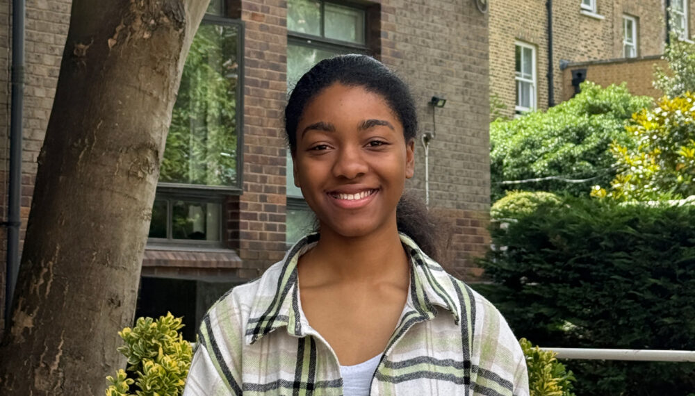 Portrait of a young black woman, smiling