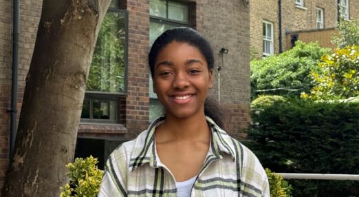 Portrait of a young black woman, smiling