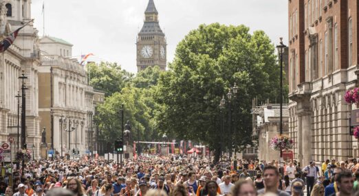 A mass of runners in London, with the Houses of Parliament in the background